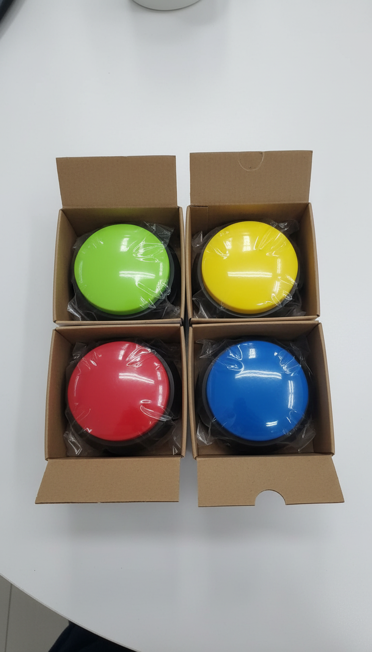 Four PawVoice buttons in their boxes